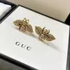 Gjia / 20 new BRASS DOUBLE g bee ring high version net red earrings, rings G0DK