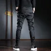 Pantalon décontracté homme coréen Streetwear noir Stretch pantalon ajusté 220325