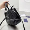 De nieuwe Mini Fashion Womens -tas is draagbaar en heeft een lange schouderriem erin om over een schouder te worden opgehangen in zwarte eenvoudige veelzijdige gecontracteerde handtassen