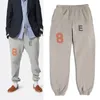 22ss Pantalones elásticos Pantalones Casual Gris Elástico Lavado Pantalones deportivos Hombres Mujeres Jogger