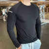 Uomo Quick Dry Fitness Tees Sport all'aria aperta Corsa Arrampicata morbido Elastico spandex Maniche lunghe Stretto Bodybuilding Top Palestra T-shirt L220704