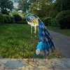 Luces solares Estatuas de pavo real Decoración de jardín Lámpara al aire libre Estatuilla hueca Camino Césped Escultura de metal Tuin Decoratie 220721