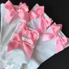 Sokken kousen zwart witte rode vakantie vrouwen dijhighs kousen met bogen sexy exotische panty's kleur kousen/kousen voor vrouwelijke zakken