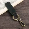 Nyckelringar Mini handväska hållare äkta kohud nyckelring äkta läderficka för bilnycklar ringklämma kvinnor män tillbehör handgjorda 2022 gåva