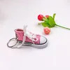 12 色クリエイティブミニ 7.5 センチメートル恋人キャンバスシューズキーホルダー男性女性のファッションスニーカー靴キーホルダーバッグ衣類ペダント小さなギフトアクセサリー