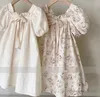 INS Petites filles robes imprimées florales enfants col carré manches bouffantes nœuds robe de princesse été enfants vêtements Q72217025904