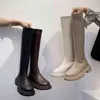 Зимние женщины бедра рыцаря Boots Flats пятка мягкие кожаные женские сапоги с самой повседневной спиной задницы растягивают длинные ботинки Y220817