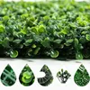 Guirnaldas de flores decorativas Piezas de boj artificial Hierba 25x25 cm Paneles de fondo Topiary Hedge Plant Garden Patio trasero Valla Greene9283074