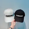 22ss Erkek Tasarımcı Topu Kapaklar Hip Hop Harfleri Baskı Beyzbol Şapkası Yaz Güneş Şapka Erkekler Kadınlar Ayarlanabilir Snapback Şapka Siyah Beyaz