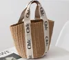 Diseñadores clásicos Bolsos de cubo de cuero tejido a la moda Bolso de canasta portátil Bolso de paja Woody Tote Barril Monedero Viajes al aire libre Bolsos de playa Crossbody Paquete de compras