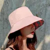 2019 Cotone Double face ricamo giallo nero Cappello da pescatore Cappello da pescatore Cappello da viaggio all'aperto Cappello da sole Cappelli per uomo e donna G220418