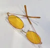 lunettes de soleil jaune ronde