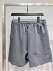 Shorts de tamanho grande masculino com impressão de algodão e bordado, trriangle ferro 100% réplica de shorts sizecotton europeus 4dw