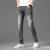 Качество бутики мужские джинсы весна и летняя тонкая стройная посадка маленькие ноги эластичный досуг тенденция двойной вышивки двойной г