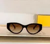 Oval Cateye Shape Solglasögon för kvinnor Guldsvart/mörkgrå linsglasögon Eyewear Accessorie UV Protection Shades with Box
