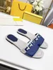 Luxus -Designer -Hausschuhe Leinwand Lederrutschen Mode Strand flache Sandalen