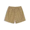 Herrshorts sommarmode utomhussporter bomull bokstav medium byxor casual byxor.