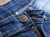 Mens jeans Europa en Amerika slanke rechte elastische patch badge gaten heren broek groot formaat