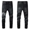 Jeans skinny neri elasticizzati per motociclista da uomo Ginocchio sottile strappato con foro Spray su lettera Paint Man Pant Splash Designer Distressed Motor Fit Cerniera lunga e dritta Hip Hop