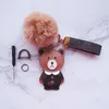 Cartoon-Bär-Schlüsselanhänger mit Pompon-Zubehör, Damen und Mädchen, süßer Schlüsselanhänger, PU-Leder, Bären, Designer-Auto-Schlüsselanhänger, Halter, modische Tier-Taschenkette, einfache Modellierung