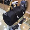 Bolsa de designer de luxo Handbag masculino Pacote de bagagem de lazer Backpacks Nylon Pano à prova d'água grande capacidade9789176