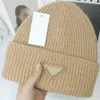 Winter plain wool beanie hat warm knit beanie hat Triangle logo short fisherman beanie hat for men and women