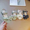 Bebek kız sandaletler 2022 Yaz Yeni Koreli Toddler Prenses Yumuşak Solda Çocuk Dot Yay-düğüm Plaj Ayakkabıları Sıradan Düz Topuklar Sıcak G220523