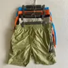 Pantaloncini CP Pantaloni da spiaggia da uomo da corsa all'aperto Pantaloni larghi ad asciugatura rapida in nylon dritto di nuova estate sportivi casual