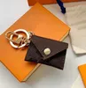 Designer Letter Wallet Keychain Keyring Fashion Purse Pendant Car Chain Charm Brown Flower Mini Bag Trinka Gifts Tillbehör Nej B215B