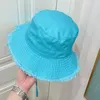 دلو قبعة مصممة فاخرة امرأة الصيف واسعة الحافة القبعات المعدنية الصلبة اللون 56232