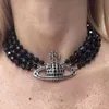 Western Empress Punk Planet Love Halsband Three-Tiered Black Bead Diamond Saturn Retro Chocker Planet Halsband Armband Ladies Sweetheart Designer Smyckesuppsättningar