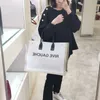 Tote Canvas Shopping Bag Borse a tracolla Uomo Donna Borse di grande capacità Borsa Lettera Decorazione interna Cerniera Tasca quadrata Borsa nera Totes Alta qualità