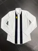 Mens Designer قمصان العلامة التجارية للرجال الرجال الطويل الأكمام قميص الهيب هوب على طراز القطن عالي الجودة من القطن 16354