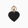 Mobiltelefonband charms hjärtnyckel kedja spänne älskare bil nyckelring handgjorda läder designers nyckelringar män kvinnor väska hänge tillbehör