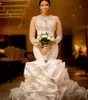 2022 Mermaid bruidsjurken Ruches Afrikaanse trouwjurken Illusie Mouwen Lace Applique kralen gelaagde rok Organza Vestidos de noiva