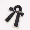 4Colors Designer Double Letters Print Flowers Bowknot Storbriket Hårband Rop Kvinnor Scrunchies Hårband Elastiska gummiban6688571