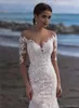 2022SHEER MANEIRA LONGA LACE Mermaid Beach Vestidos de noiva Jeia Apliques de pescoço Ilusão Trem vestidos de noiva Dubai com botões BC22299