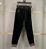 2022 Winter Men's TrackSuits Luksusowy projektant Red Green Stripe Fabric z podwójnym rękawem litery sportowe garnitur do joggingu Suits M-3xl