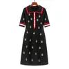 Printemps été tricot dessin animé brodé Polo robe femme grande taille noir décontracté genou longueur robes droites femme 220514