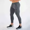 Nieuwe joggers zweetwedstrijden mannen casual skinny broek sportscholen
