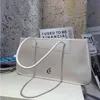 한국 틈새 디자이너 브랜드 가방 새로운 패션 간단한 대용량 캔버스 원 어깨 휴대용 겨드랑이 백 220613