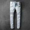 Jeans de designer jeans distribuídos motociclistas rasgados slim fit motociclistas jeans para homens de moda mans calças pretas derramar hommes