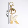 Gold Color Bell Charms Alfabet Keychain English Letter Keyring Glitter Gradient Harts Leaf Crafts Car Handbag Pendant Keychain