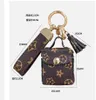 Keychains Top Lanyards 4Colors Söta Presbyopia Leather Cartoon Keychain Coin Purse Headset Mini School Bag Design Tassel Key Ring Pu Leather Car Keychains Jewelry B B