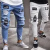 Jeans masculinos Men elástico rasgado para motociclista de bordado de bordado de desenho animado jeans destes 220823