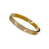 Womens Designer Bracciale in oro da uomo Bangle Lettera Bracciali Gioielli Diamanti spessi Bracciali Donna Uomo Bracciale retrò 2205275D