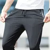 Summer Casual Thin Men Pants Highelastic Ice Silk Spodnie Męskie Koreańskie AnkleLength Youth Harem Plus Size 5xl 201112
