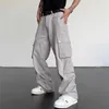 Herenbroekaankomsten Zijzakken Katoen Caponal Baggy Men Cargo Zipper Design militaire mannelijke lange broek Tactische kledinglieden