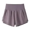 LL113 Abiti da yoga da donna Abbigliamento sportivo a vita alta Cheerleader Pantaloncini Esercizio Abbigliamento fitness Pantaloni corti Ragazze che corrono Elastico Previeni il guardaroba Culotte foderato