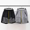 Rhude Shorts Men Women Big Letter Rhudes Oversize Breechcloth Yellow Drawstring Pill Zipper Head TRM6 6O1X